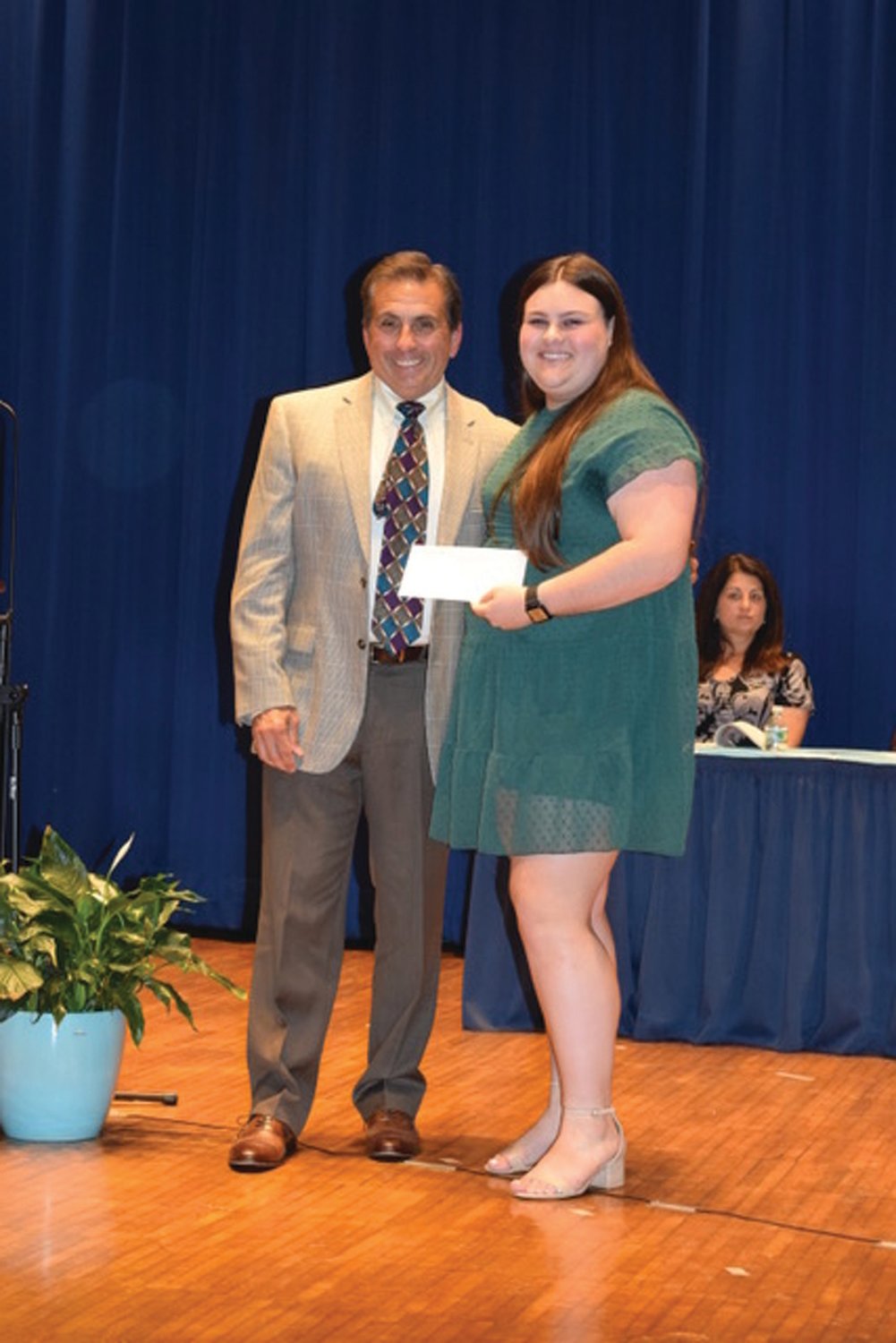 PRESIDENT’S AWARD: Greg Russo, who chairs the JHS Science Department and serves as Student Council and SADD Advisor, is all smiles while presenting the Student Council President’s Award to Rebecca Clements.
